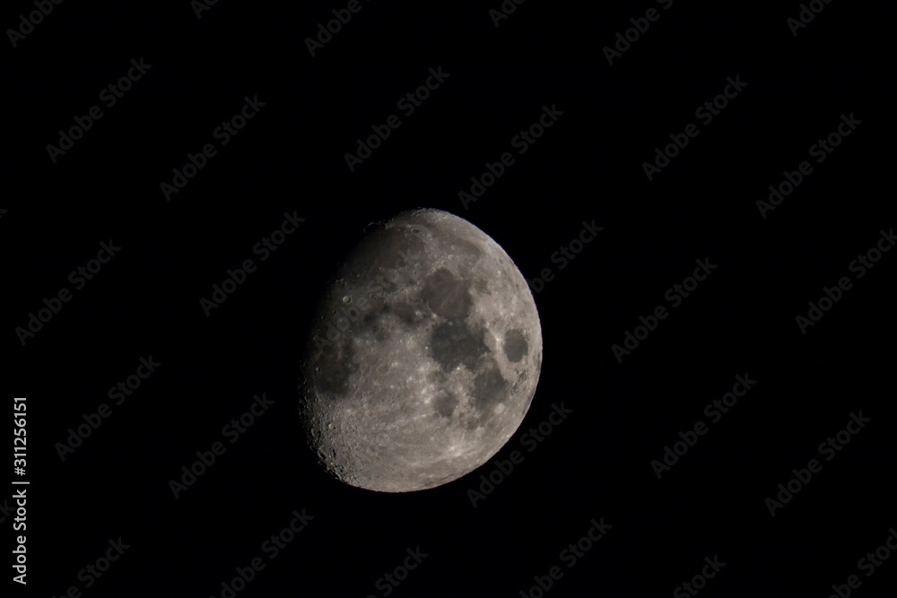 A close up portrait of the moon surrounded by the darkness and mystery of space. A close up portrait of the moon surrounded by the darkness and mystery of space.