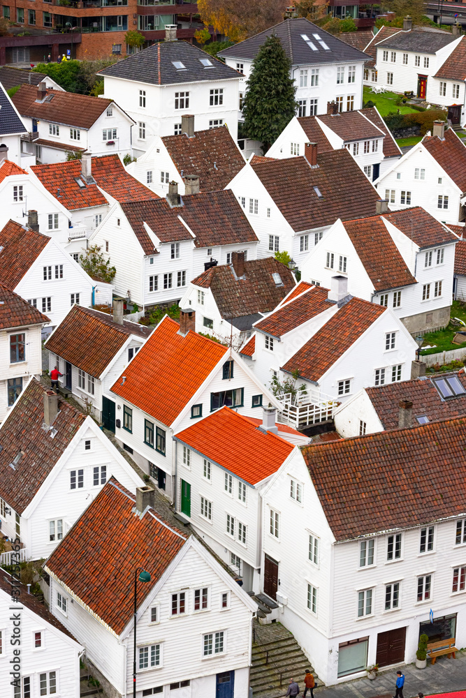 White houses and red rooftops, typical for the historic district Gamle Stavanger (Old Stavanger) in Stavanger, Norway