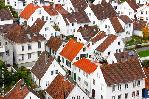 White houses and red rooftops, typical for the historic district Gamle Stavanger (Old Stavanger) in Stavanger, Norway