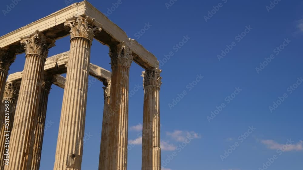 Temple of Olympian Zeus ruins stand against a blue sky in Athens, Greece Temple of Olympian Zeus ruins stand against a blue sky in Athens, Greece