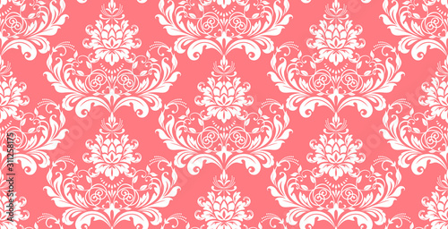 Wallpaper in the style of Baroque. Seamless vector background. White and pink floral ornament. Graphic pattern for fabric, wallpaper, packaging. Ornate Damask flower ornament