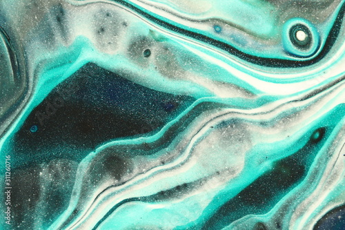 Abstract teal, white, and black flowing background.