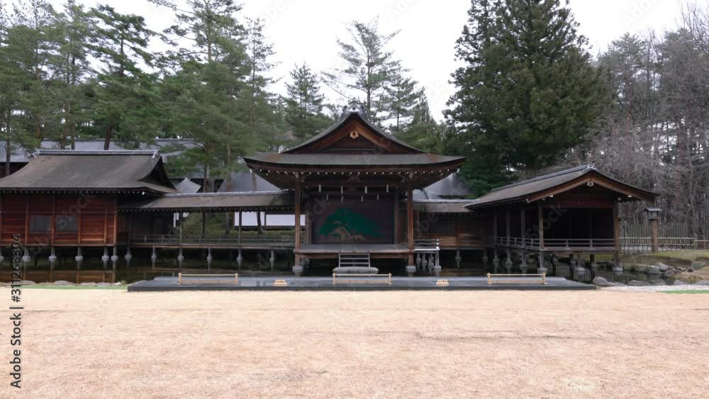 Yamanashi,Japan-December 22, 2019: Open Air Noh Stage, the stage for the performance of Nohgaku--the Japanese traditional art. Yamanashi,Japan-December 22, 2019: Open Air Noh Stage, the stage for the performance of Nohgaku--the Japanese traditional art.