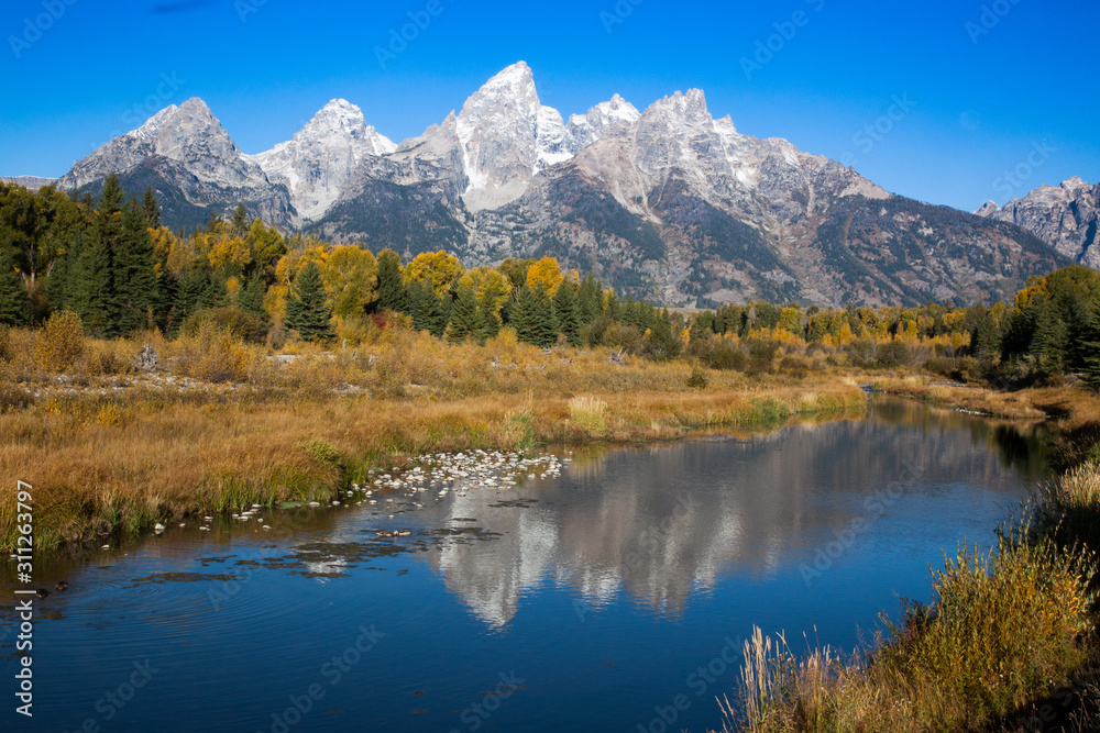 Teton Mountains reflected in the Snake River