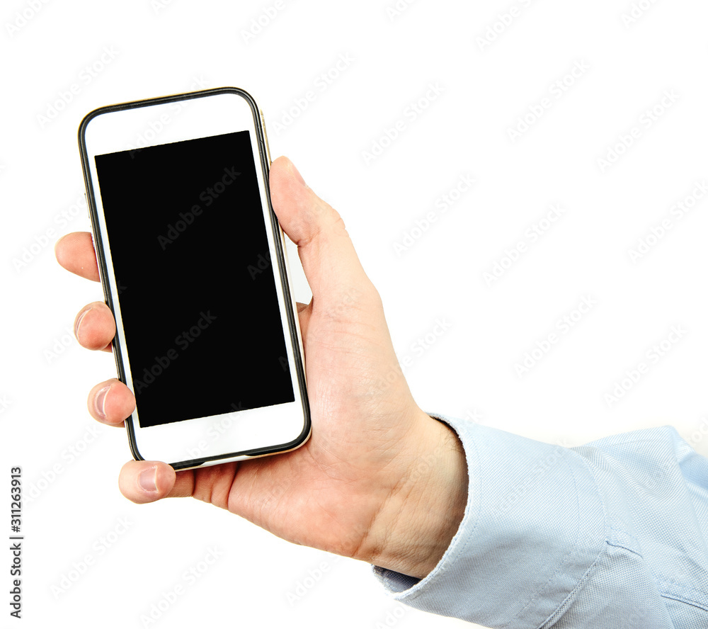 Phone in hand on a white background. A man holds a phone with a blank display in his hand. The concept of supplementing content, providing information. Phone in hand on a white background. A man holds a phone with a blank display in his hand. The concept of supplementing content, providing information.