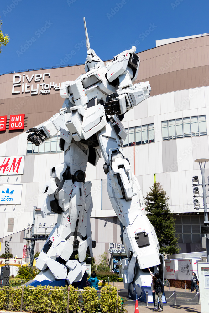 TOKYO, JAPAN - April 28, 2019, The unidentified traveler look at RX-0  Unicorn Gundam statue in normal mode located at Diver City Tokyo Plaza  Tokyo, Odaiba Stock Photo | Adobe Stock