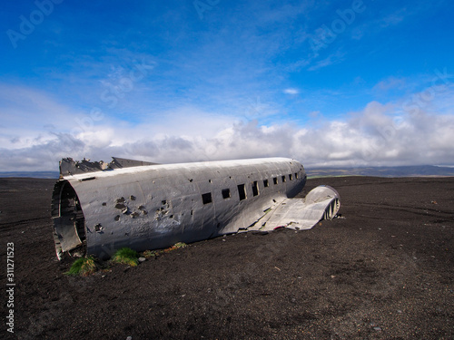 Wreck of a US military plane crashed in the middle of the nowhere. The plane ran out of fuel and crashed in a desert not far from Vik, South Iceland in 1973. photo