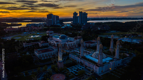 Beautiful aerial view of silhouette Kota Iskandar Mosque located at Kota Iskandar, Iskandar Puteri, Johor State Malaysia early in the morning