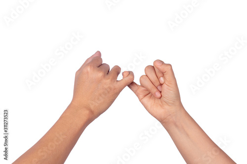 Women and man hands hook pinky fingers together to promise,Loving couple holding little fingers,Romantic moment hand in hand concept,isolated on white background photo
