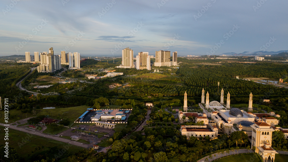 Beautiful aerial landscape of sunrise at The Kota Iskandar Mosque located at Kota Iskandar, Iskandar Puteri, Johor State  Malaysia early in the morning