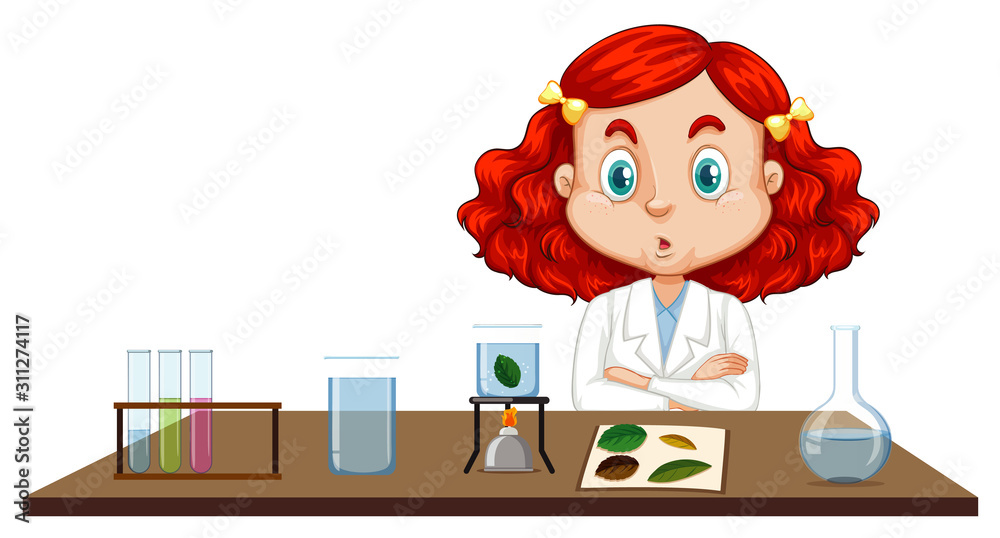 Girl in science gown sitting at the table