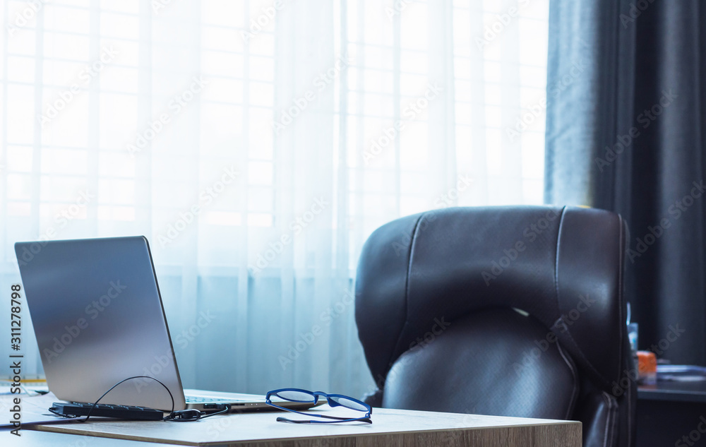 Fototapeta premium Laptop on desk in office.