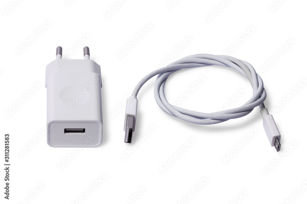 White Adapter Charger with usb cable isolate on white background. White Adapter Charger with usb cable isolate on white background.