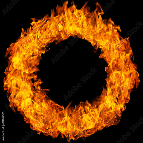 Ring of flaming fire with black hole on dark background for graphic design purpose with copy space