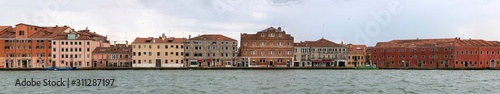 View of the houses and promenade of the island of Giudecca in Venice