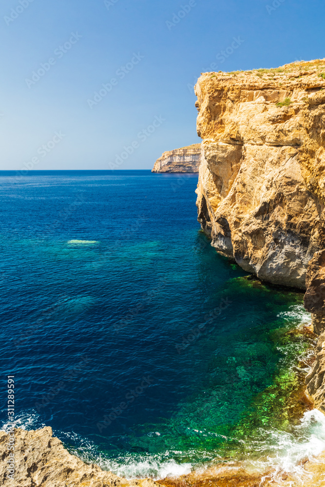 Fototapeta premium Ruins of Azure Windows in Dwejra Bay in Malta with its dramatic coastal formations