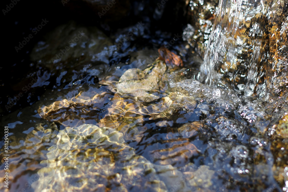 smooth clear water float on stone,rock water movement smooth clear water float on stone,rock water movement