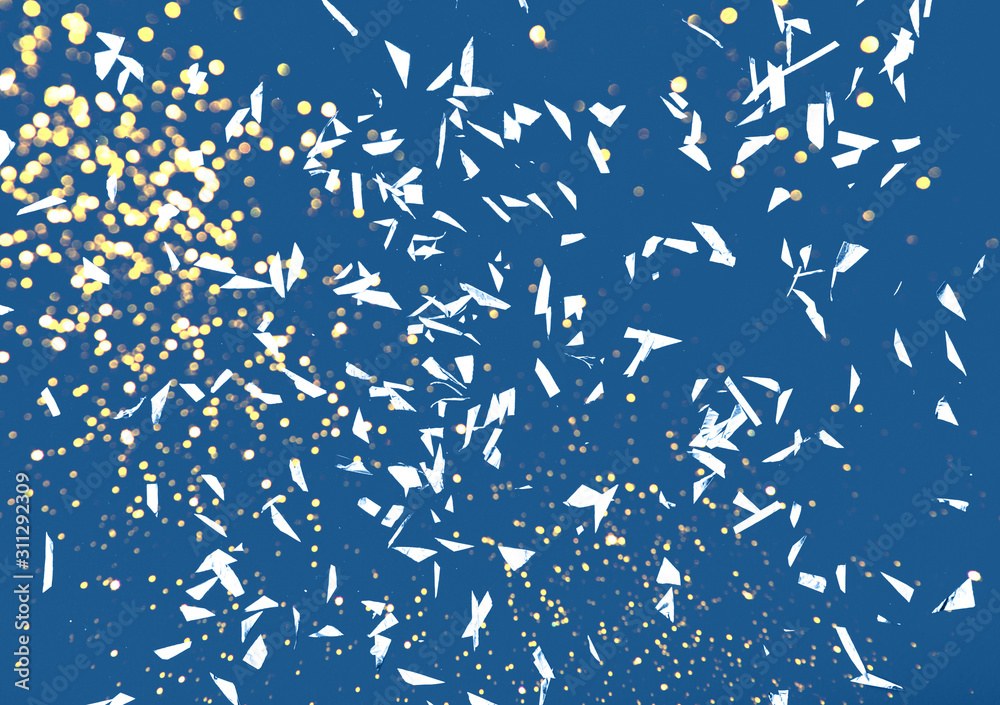 Silver sparkles on blue background Silver sparkles on blue background