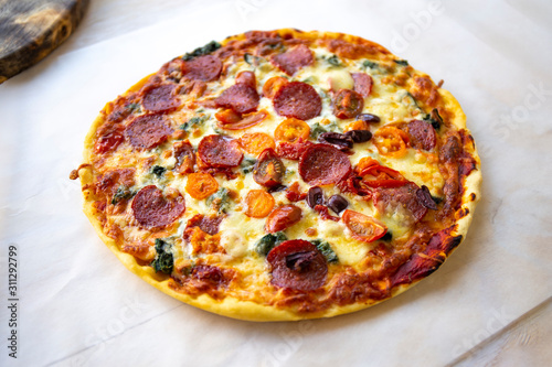 Chorizo, tomato and mozzarella cheese pizza