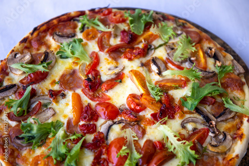 Chorizo, tomato and mozzarella cheese pizza