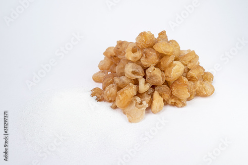 Dried longan and sugar the preservation of food form farmers on white background.