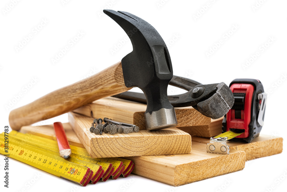 Close-up of hammer and carpenter's tools on a white background. Construction industry, do it yourself. 