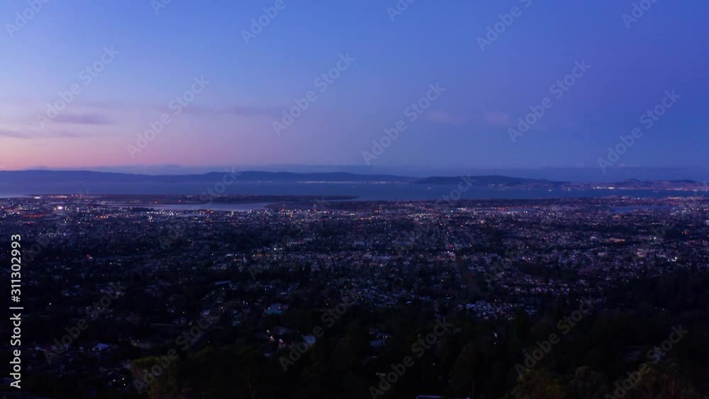 Early morning sunrise over the city and urban woods. Early morning sunrise over the city and urban woods.