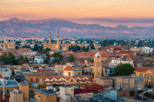 Beautiful aerial view over old town of Nicosia, Northern Cyprus and Selimiye Mosque in Cyprus  photo