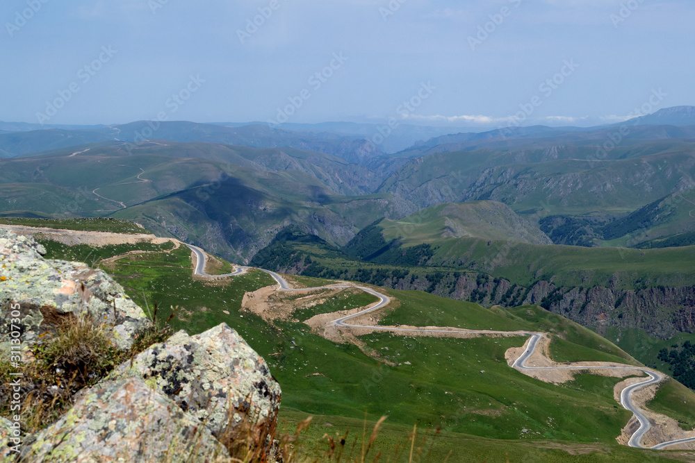 Nature landscape. Winding mountain road. Caucasus 