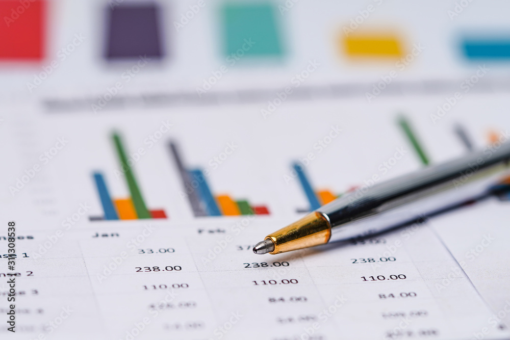Pen on charts graphs spreadsheet paper. Financial development, Banking Account, Statistics, Investment Analytic research data economy, Stock exchange Business office company meeting concept.. Pen on charts graphs spreadsheet paper. Financial development, Banking Account, Statistics, Investment Analytic research data economy, Stock exchange Business office company meeting concept..