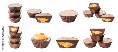 Set of chocolate peanut butter cups on white background