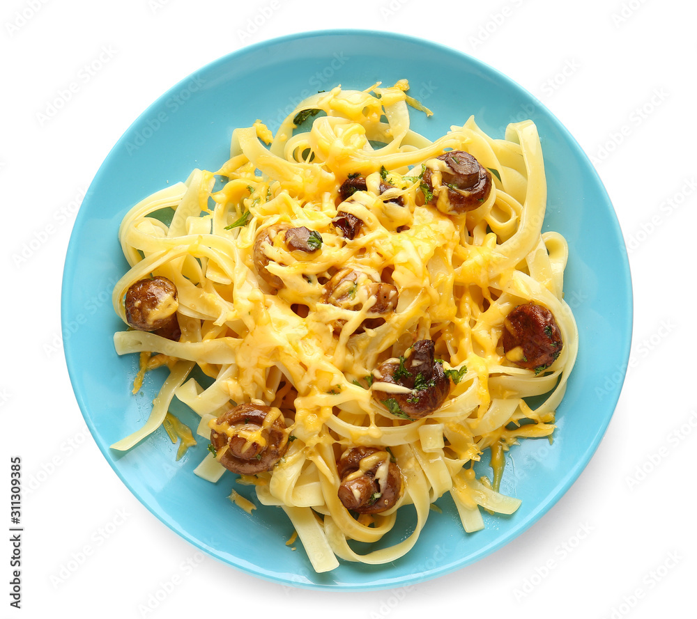 Plate with tasty cooked mushrooms and pasta on white background Plate with tasty cooked mushrooms and pasta on white background