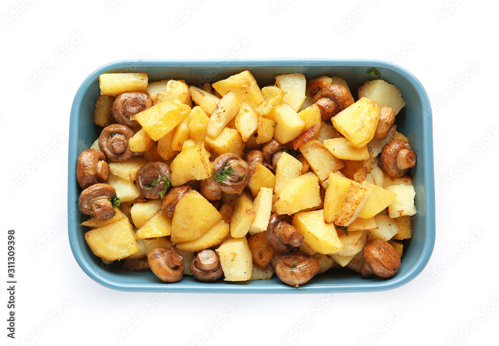Baking dish with tasty cooked mushrooms and potato on white background Baking dish with tasty cooked mushrooms and potato on white background
