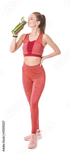 Sporty young woman with bot...