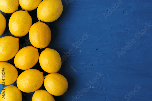 Lemon on classic blue background, top view