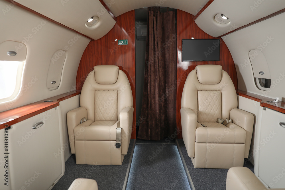 Fototapeta premium Inside view of modern private airplane