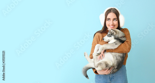 Cute woman with funny husky...