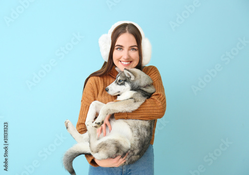 Cute woman with funny husky...