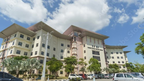 timelapse of moving clouds over government building at Alor Setar