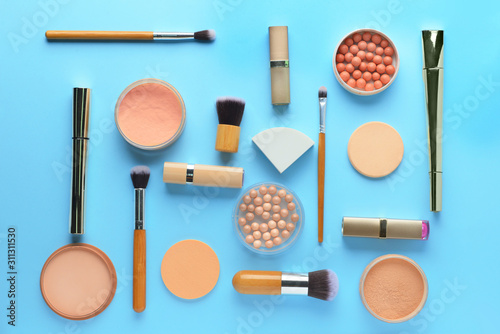 Set of decorative cosmetics on color background