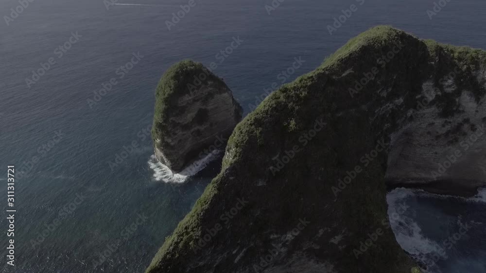 Huge rocks and mountains in the ocean, aerial footage, tropical view, Bali Huge rocks and mountains in the ocean, aerial footage, tropical view, Bali