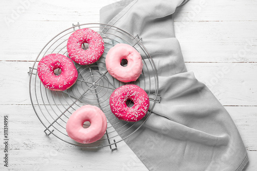 Fototapeta Naklejka Na Ścianę i Meble -  Sweet tasty donuts on table
