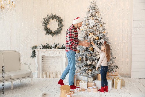 Father with little daughter...