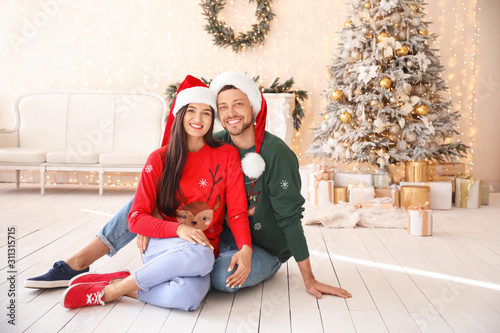 Happy couple on Christmas e...