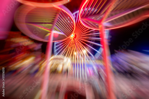 amusement park at night .colorful spinning carousel © babaroga