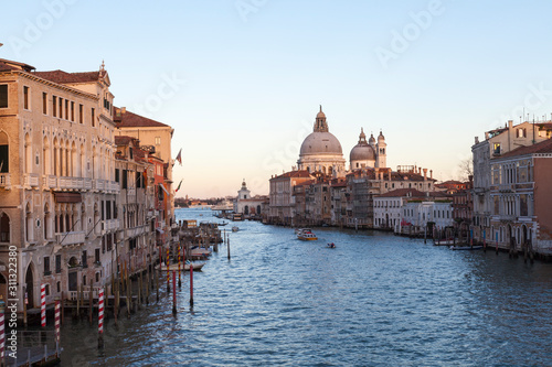 View from Accademia Bridge of the Grand Canal and Basilica Santa Maria della Salute, Venice, Italy at sunset