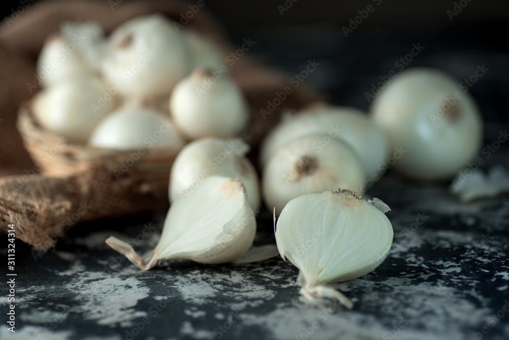 Onions on textured background. Food Ingredients. Onions on textured background. Food Ingredients.