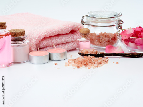 Spa of rose oil, pink himalayan salt.