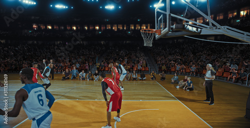 Basketball players on big professional arena during the game. Tense moment of the game. Celebration