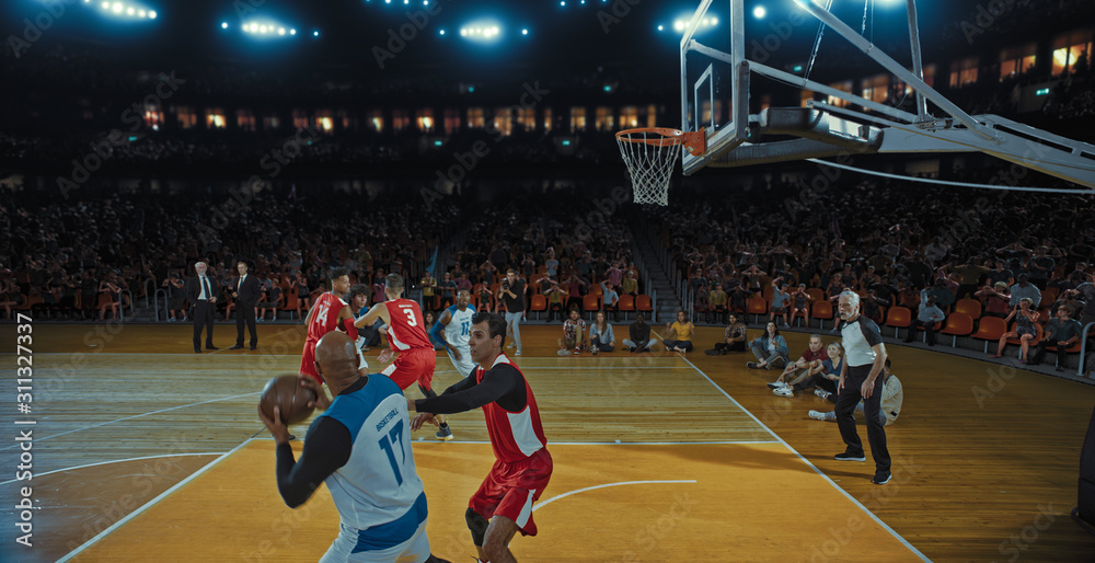 Obraz premium Basketball players on big professional arena during the game. Tense moment of the game. Celebration